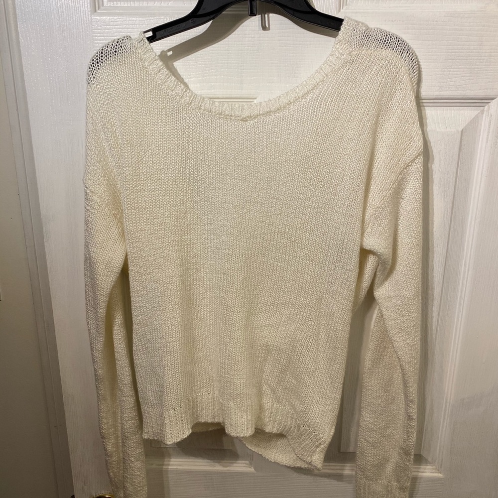 Exposed back V shaped sweater